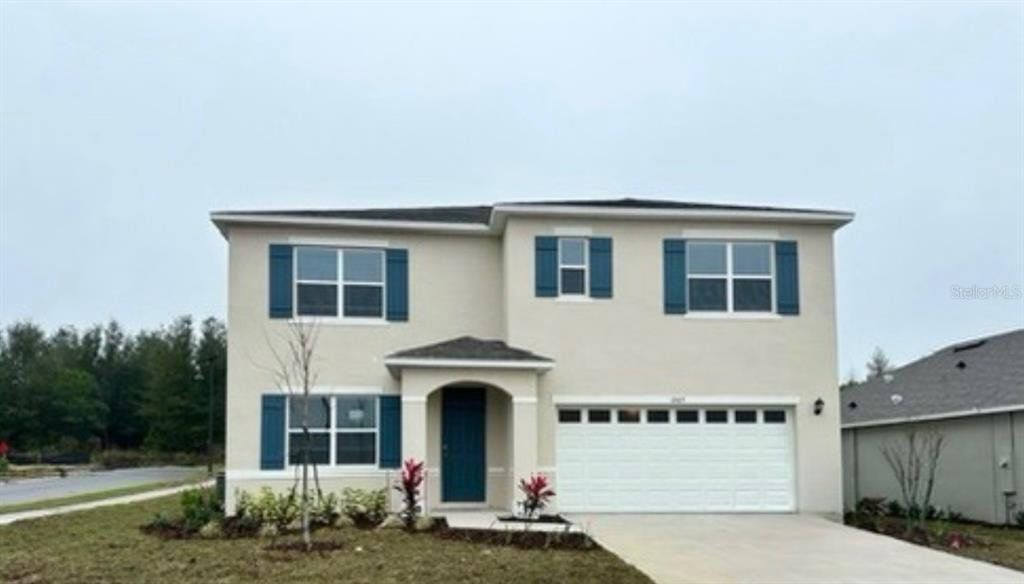 Front exterior of a new home in , Mount Dora, FL, highlighting curb appeal (Image 1). Front exterior of a new home in , Mount Dora, FL, highlighting curb appeal (Image 1).