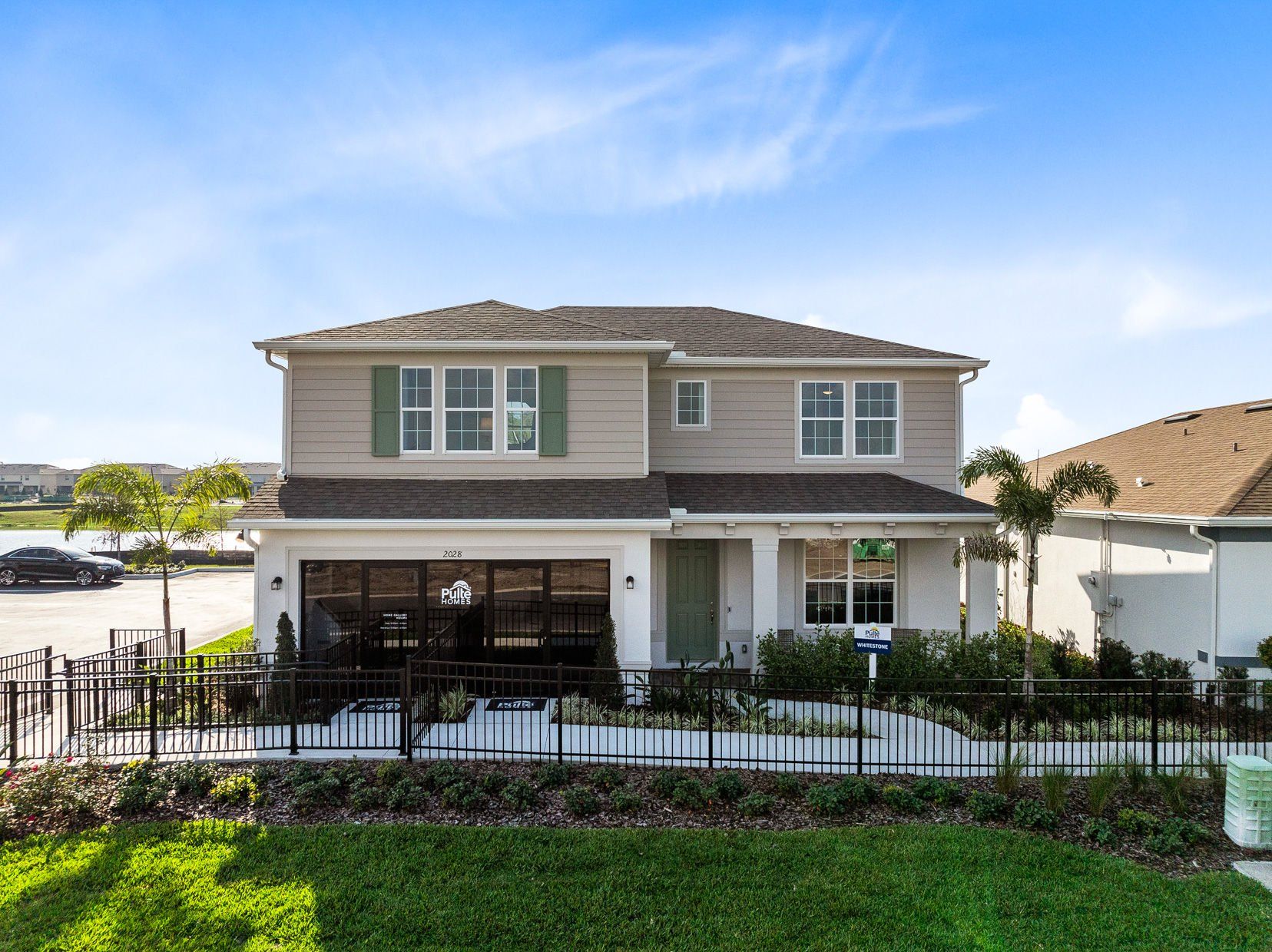 Front exterior of a new home in The Landings at Live Oak Lake, St. Cloud, FL, highlighting curb appeal (Image 1). Front exterior of a new home in The Landings at Live Oak Lake, St. Cloud, FL, highlighting curb appeal (Image 1).