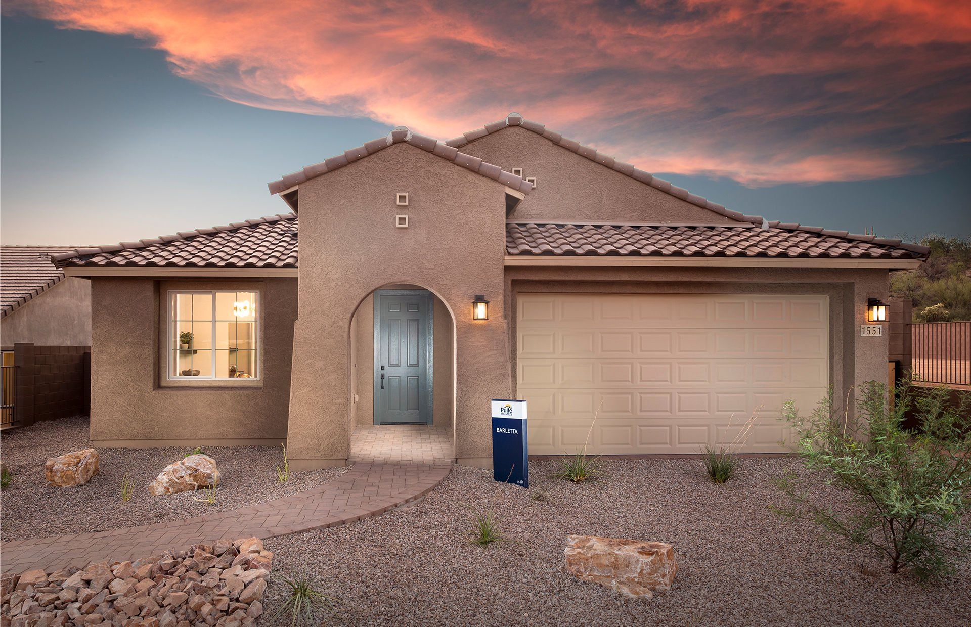 Front exterior of a new home in Vistoso Canyon Estates, Oro Valley, AZ, highlighting curb appeal (Image 1). Front exterior of a new home in Vistoso Canyon Estates, Oro Valley, AZ, highlighting curb appeal (Image 1).