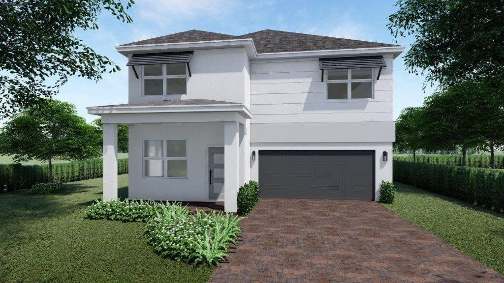 Front exterior of a new home in Hunters Manor, Pompano Beach, FL, highlighting curb appeal (Image 1).