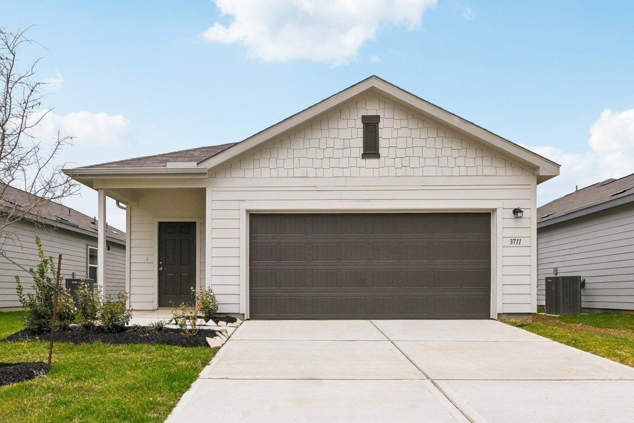 Front exterior of a new home in Elm Park, Austin, TX, highlighting curb appeal (Image 1). Front exterior of a new home in Elm Park, Austin, TX, highlighting curb appeal (Image 1).