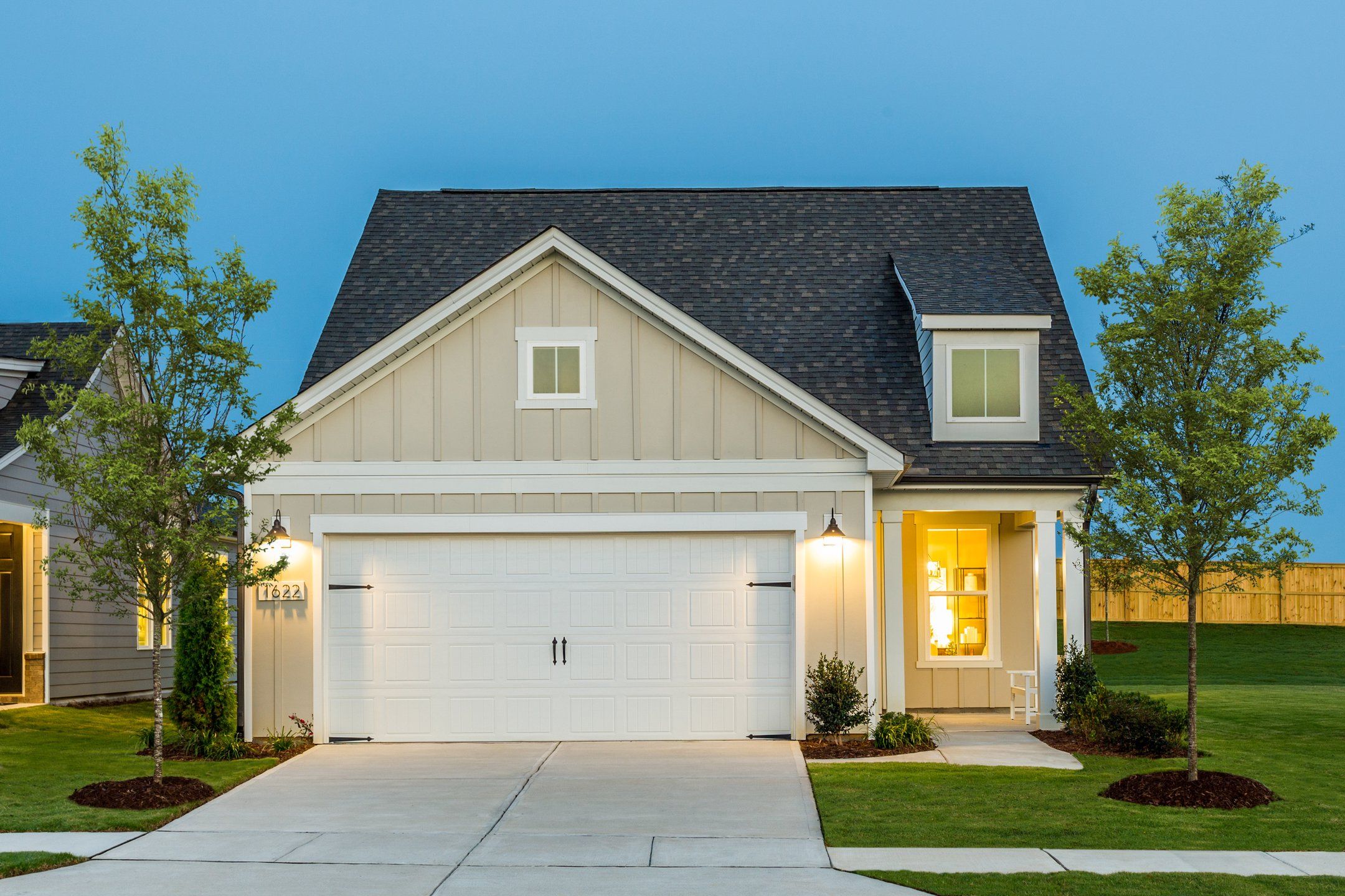 Front exterior of a new home in The Haven at Riverlights, Wilmington, NC, highlighting curb appeal (Image 1). Front exterior of a new home in The Haven at Riverlights, Wilmington, NC, highlighting curb appeal (Image 1).