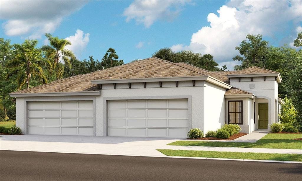 Front exterior of a new home in Crosswind Point, Parrish, FL, highlighting curb appeal (Image 1). Front exterior of a new home in Crosswind Point, Parrish, FL, highlighting curb appeal (Image 1).