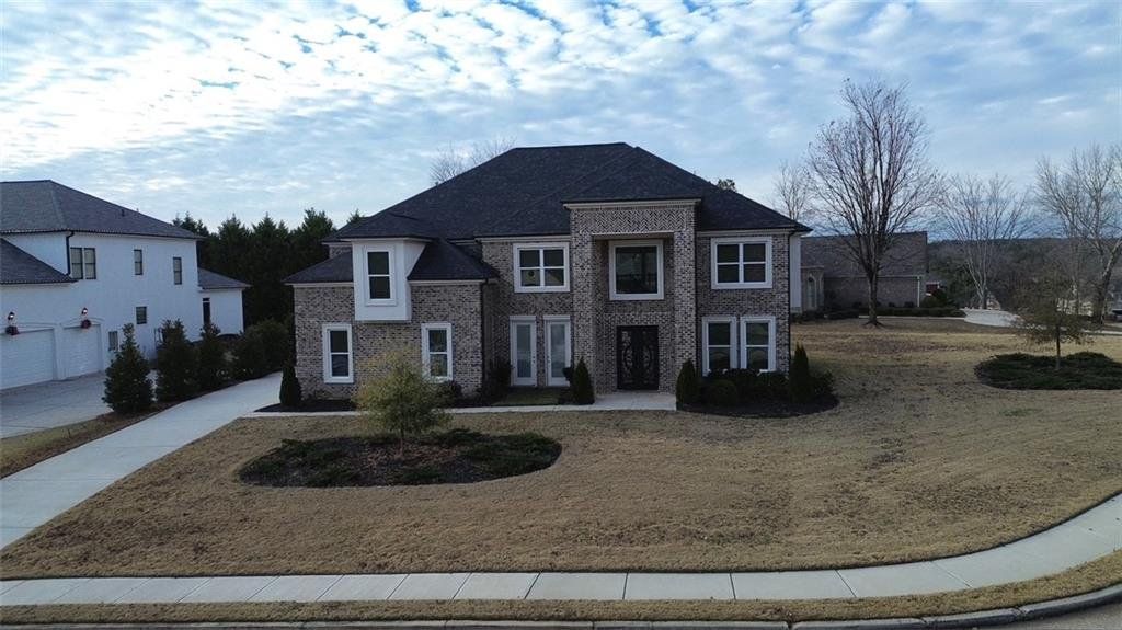 Front exterior of a new home in , Lithonia, GA, highlighting curb appeal (Image 1). Front exterior of a new home in , Lithonia, GA, highlighting curb appeal (Image 1).