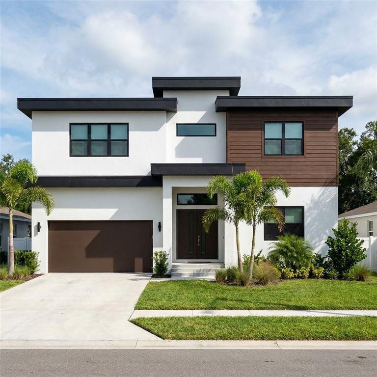 Front exterior of a new home in , Tampa, FL, highlighting curb appeal (Image 1). Front exterior of a new home in , Tampa, FL, highlighting curb appeal (Image 1).
