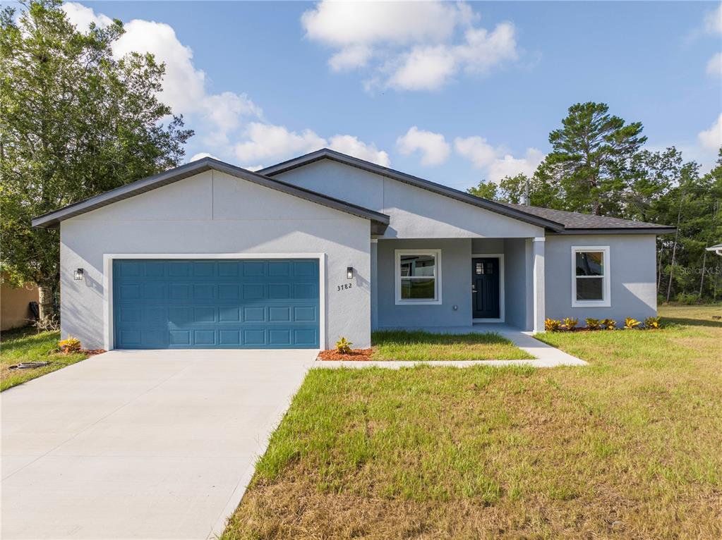 Front exterior of a new home in , Ocala, FL, highlighting curb appeal (Image 1). Front exterior of a new home in , Ocala, FL, highlighting curb appeal (Image 1).