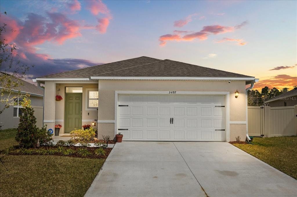 Front exterior of a new home in Concorde, Sanford, FL, highlighting curb appeal (Image 1). Front exterior of a new home in Concorde, Sanford, FL, highlighting curb appeal (Image 1).