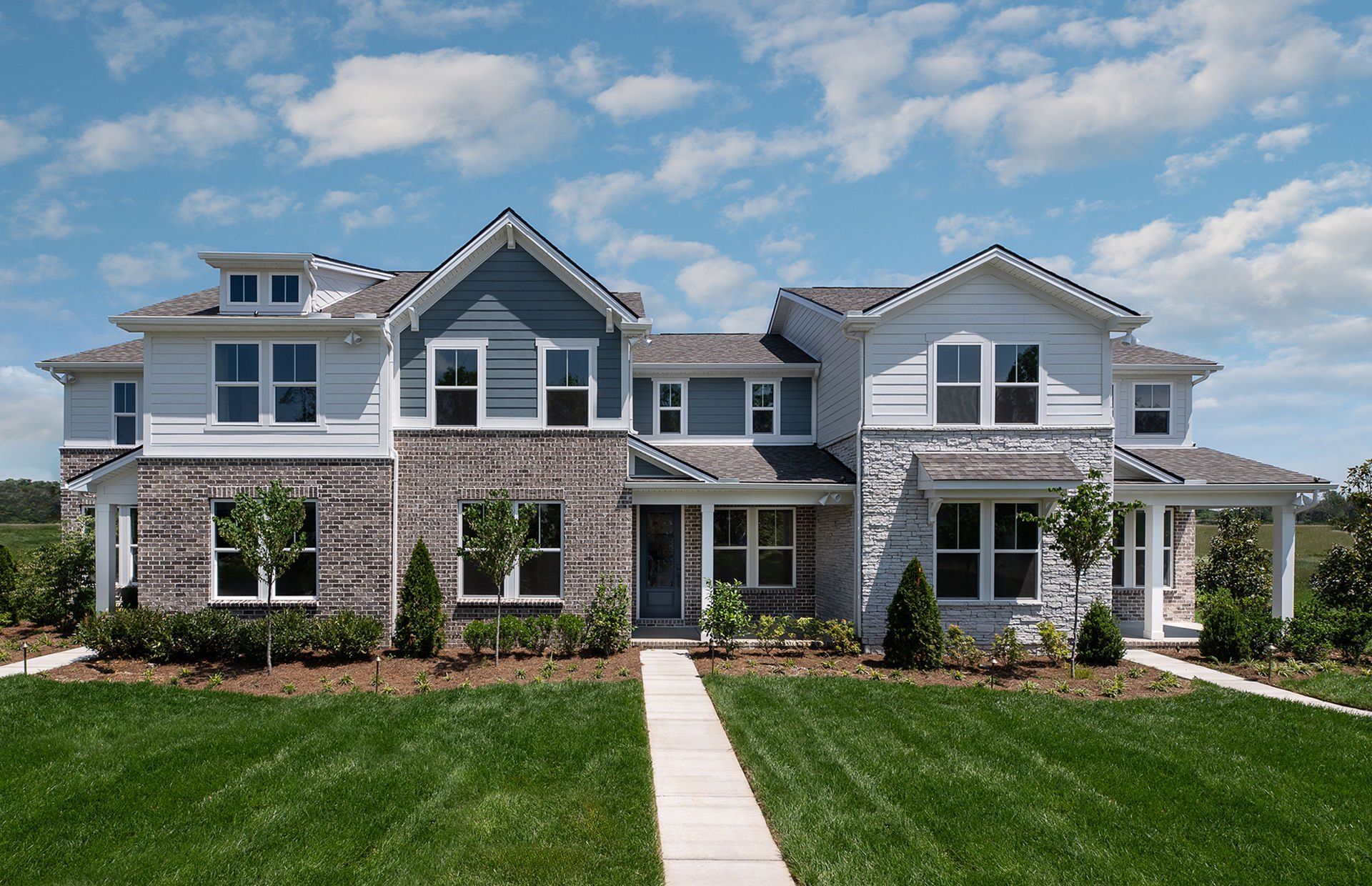 Front exterior of a new home in Bradshaw Farms Reserve, Mount Juliet, TN, highlighting curb appeal (Image 1). Front exterior of a new home in Bradshaw Farms Reserve, Mount Juliet, TN, highlighting curb appeal (Image 1).