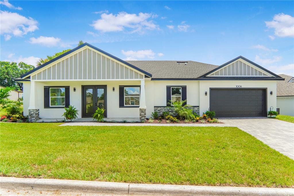 Front exterior of a new home in , Apopka, FL, highlighting curb appeal (Image 1). Front exterior of a new home in , Apopka, FL, highlighting curb appeal (Image 1).