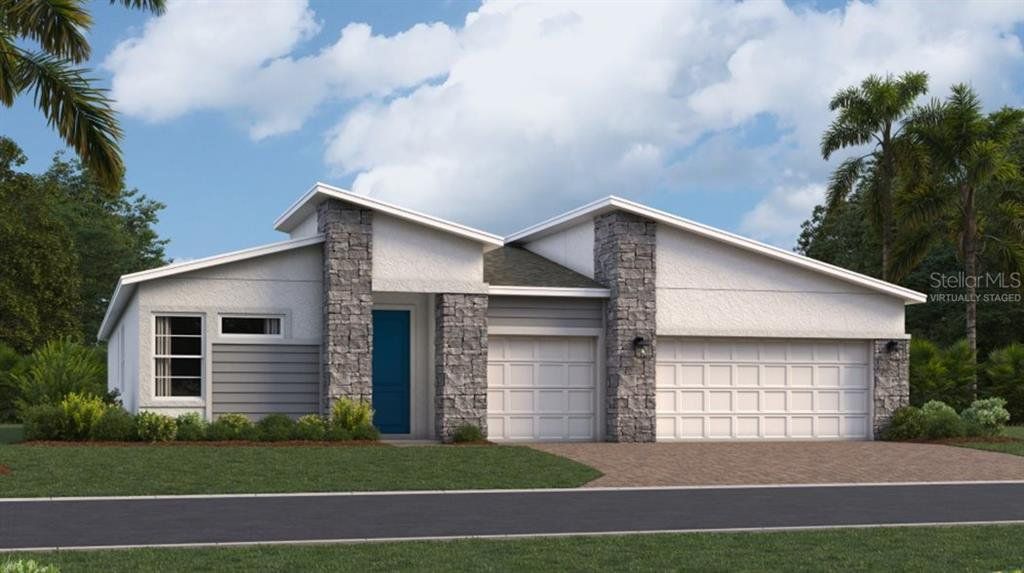 Front exterior of a new home in Bronson's Ridge, Apopka, FL, highlighting curb appeal (Image 1). Front exterior of a new home in Bronson's Ridge, Apopka, FL, highlighting curb appeal (Image 1).