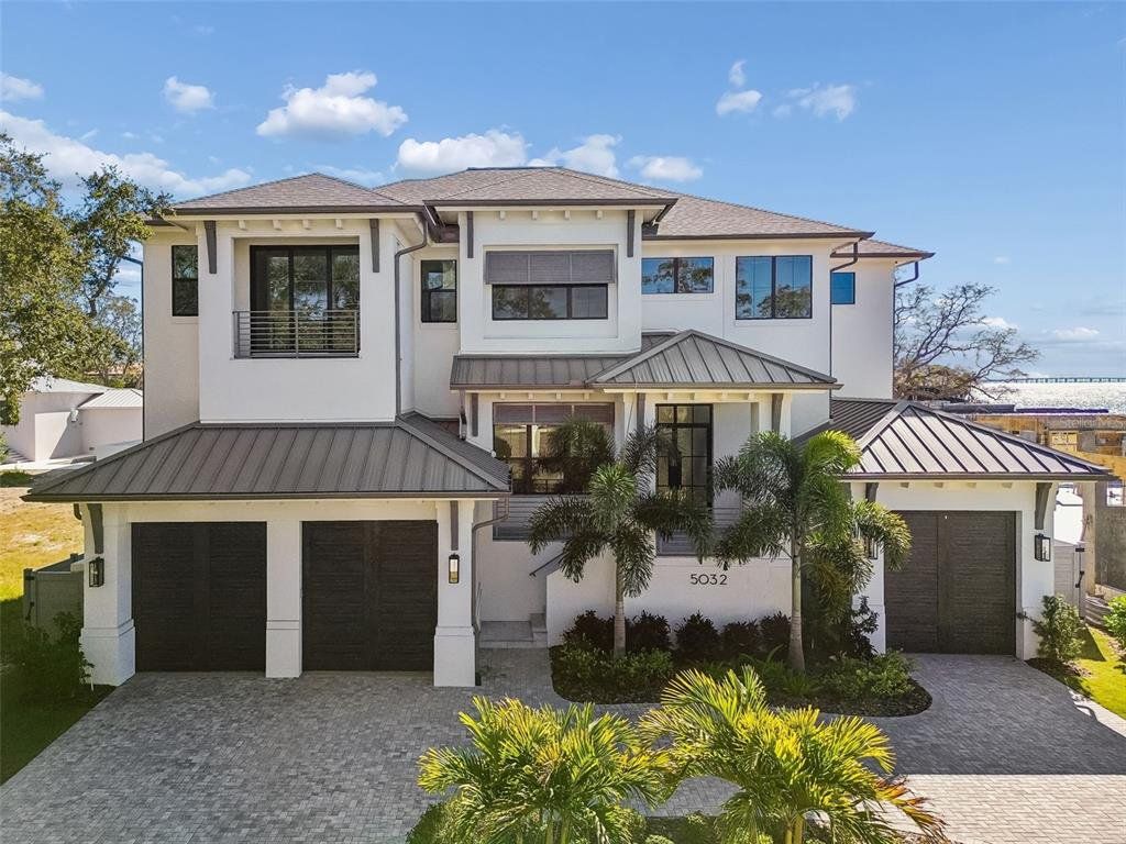 Front exterior of a new home in , Tampa, FL, highlighting curb appeal (Image 1). Front exterior of a new home in , Tampa, FL, highlighting curb appeal (Image 1).