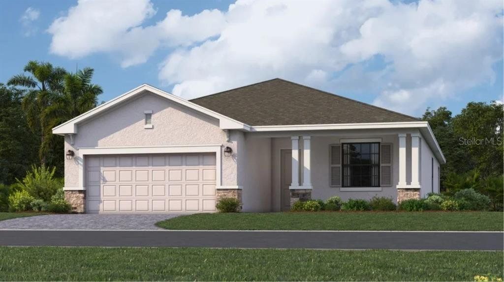 Front exterior of a new home in Rye Ranch: Executive Homes, Parrish, FL, highlighting curb appeal (Image 1). Front exterior of a new home in Rye Ranch: Executive Homes, Parrish, FL, highlighting curb appeal (Image 1).