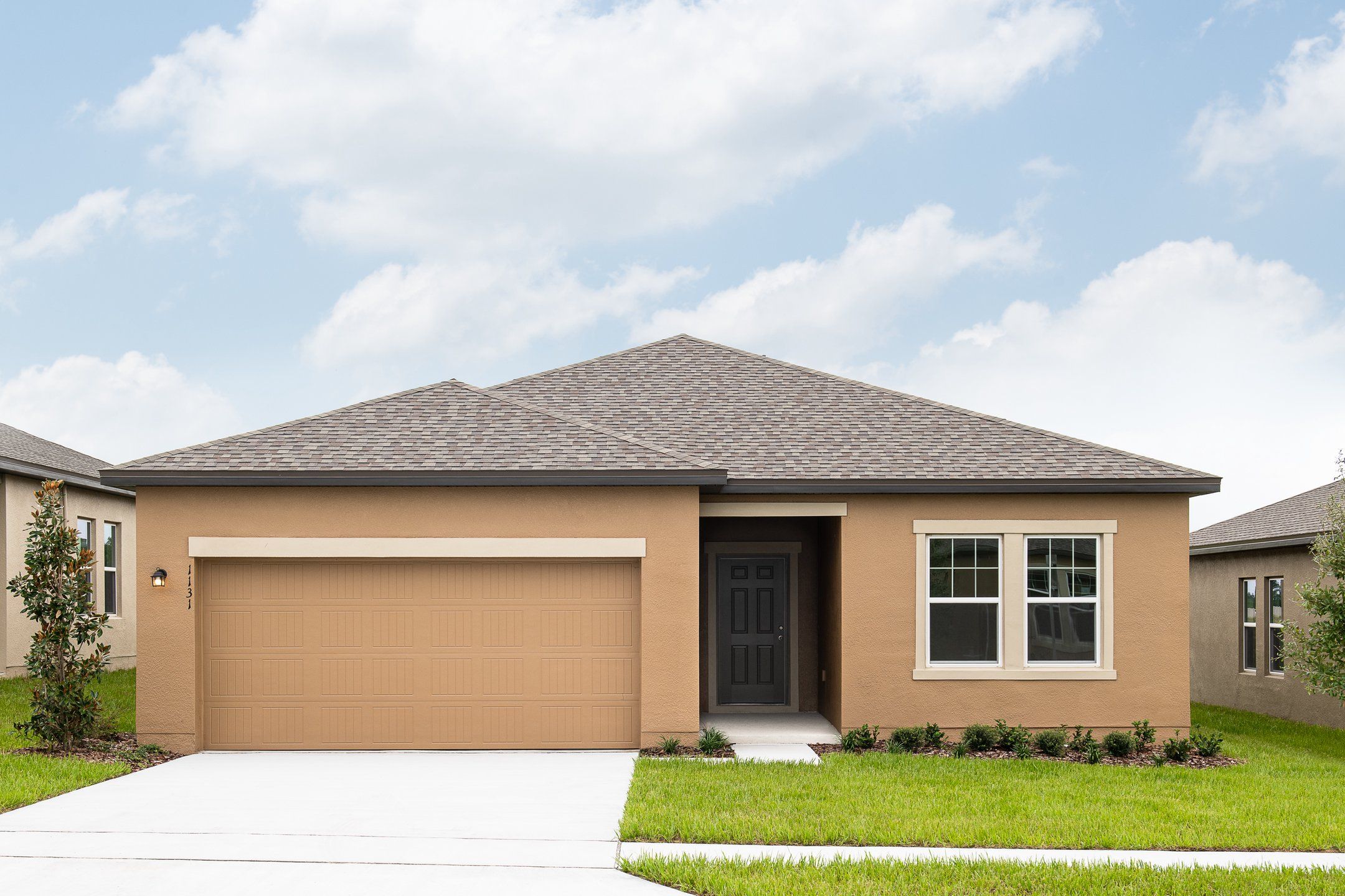 Front exterior of a new home in Sunset Hills, Winter Haven, FL, highlighting curb appeal (Image 1). Front exterior of a new home in Sunset Hills, Winter Haven, FL, highlighting curb appeal (Image 1).