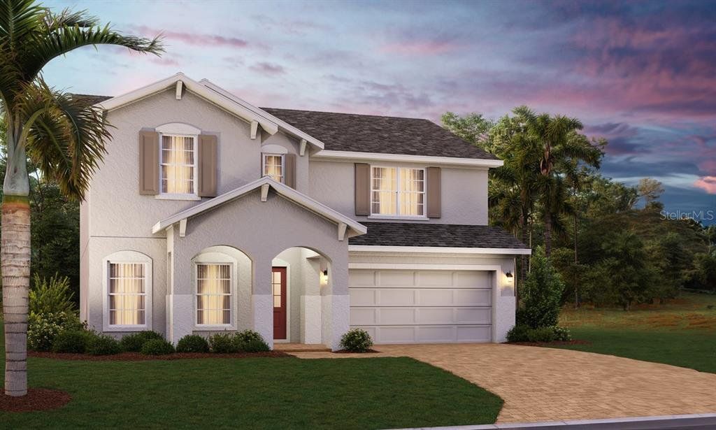 Front exterior of a new home in Trinity Lakes, Groveland, FL, highlighting curb appeal (Image 1). Front exterior of a new home in Trinity Lakes, Groveland, FL, highlighting curb appeal (Image 1).