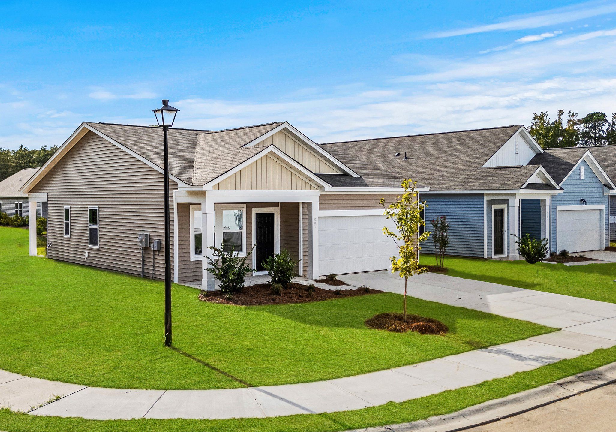 Front exterior of a new home in Andalusia, Loris, SC, highlighting curb appeal (Image 1).