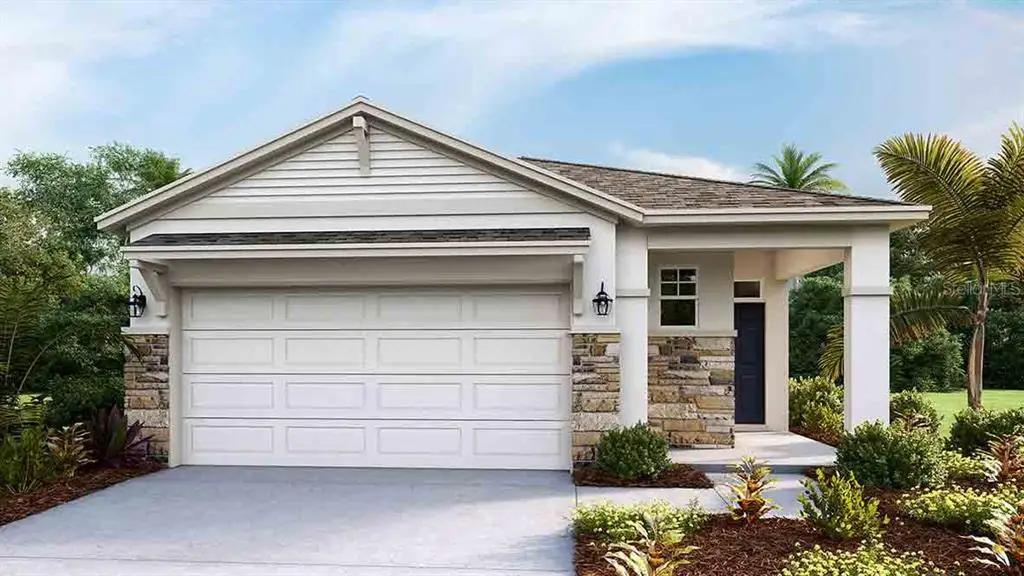 Front exterior of a new home in Twisted Oaks, Wildwood, FL, highlighting curb appeal (Image 1). Front exterior of a new home in Twisted Oaks, Wildwood, FL, highlighting curb appeal (Image 1).
