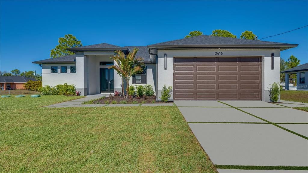 Front exterior of a new home in , Lehigh Acres, FL, highlighting curb appeal (Image 1). Front exterior of a new home in , Lehigh Acres, FL, highlighting curb appeal (Image 1).