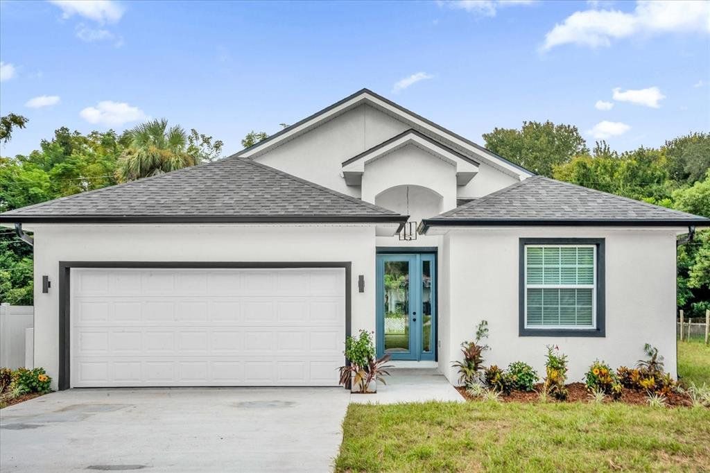 Front exterior of a new home in , Sanford, FL, highlighting curb appeal (Image 1). Front exterior of a new home in , Sanford, FL, highlighting curb appeal (Image 1).