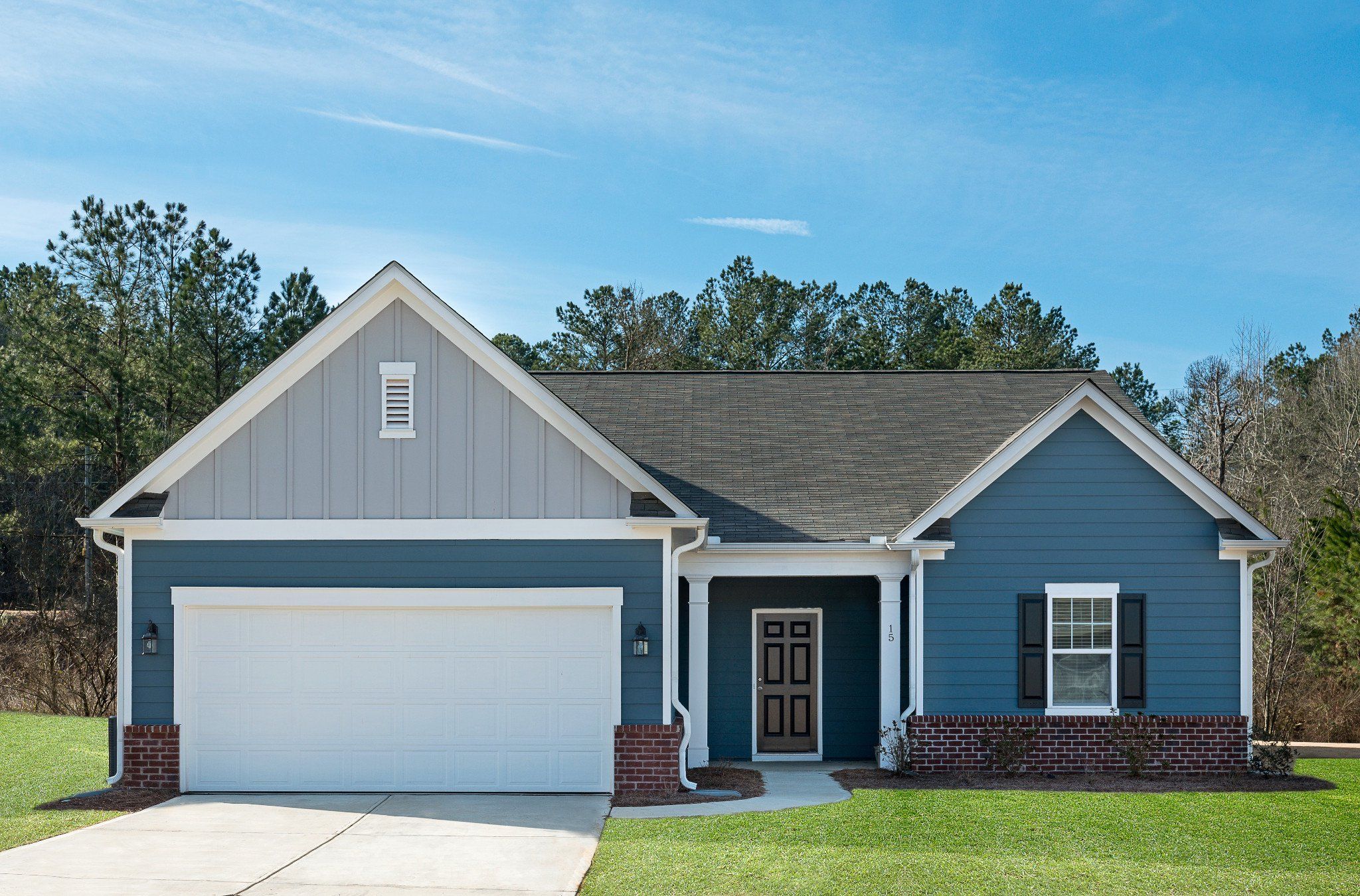 Front exterior of a new home in Mt. Tabor Ridge, Dallas, GA, highlighting curb appeal (Image 1). Front exterior of a new home in Mt. Tabor Ridge, Dallas, GA, highlighting curb appeal (Image 1).