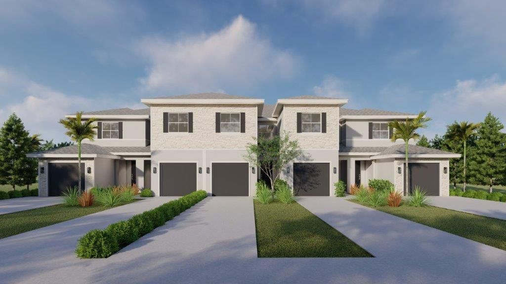 Front exterior of a new home in Lakeside Landing, Royal Palm Beach, FL, highlighting curb appeal (Image 1). Front exterior of a new home in Lakeside Landing, Royal Palm Beach, FL, highlighting curb appeal (Image 1).