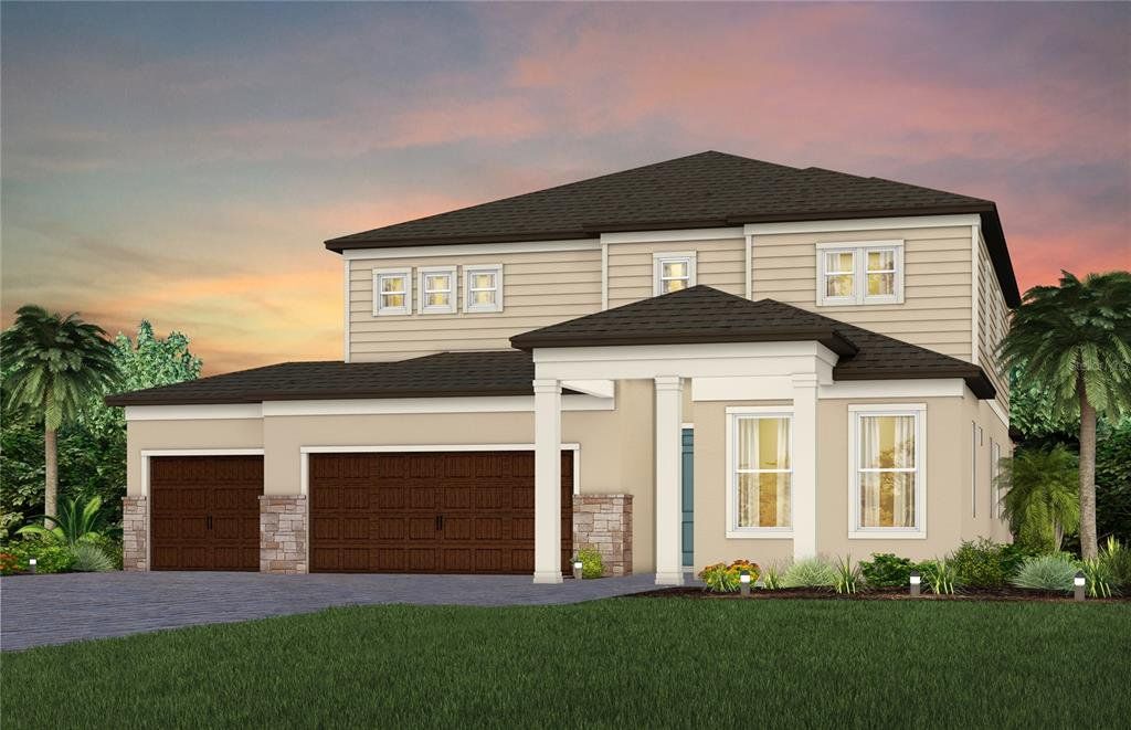 Front exterior of a new home in Vida's Way, Wesley Chapel, FL, highlighting curb appeal (Image 1). Front exterior of a new home in Vida's Way, Wesley Chapel, FL, highlighting curb appeal (Image 1).