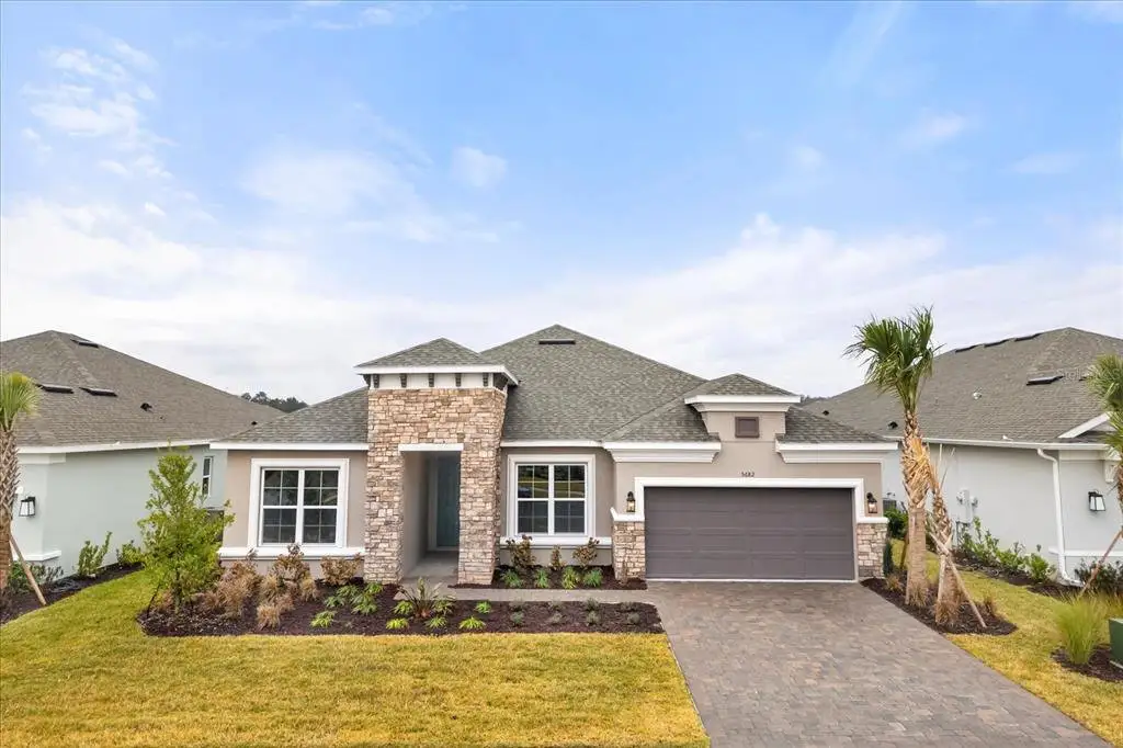 Front exterior of a new home in , Kissimmee, FL, highlighting curb appeal (Image 1). Front exterior of a new home in , Kissimmee, FL, highlighting curb appeal (Image 1).