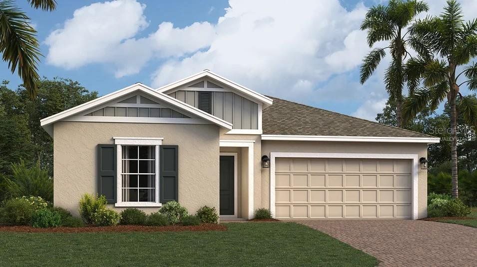 Front exterior of a new home in Waterstone: Estate Collection, Groveland, FL, highlighting curb appeal (Image 1).