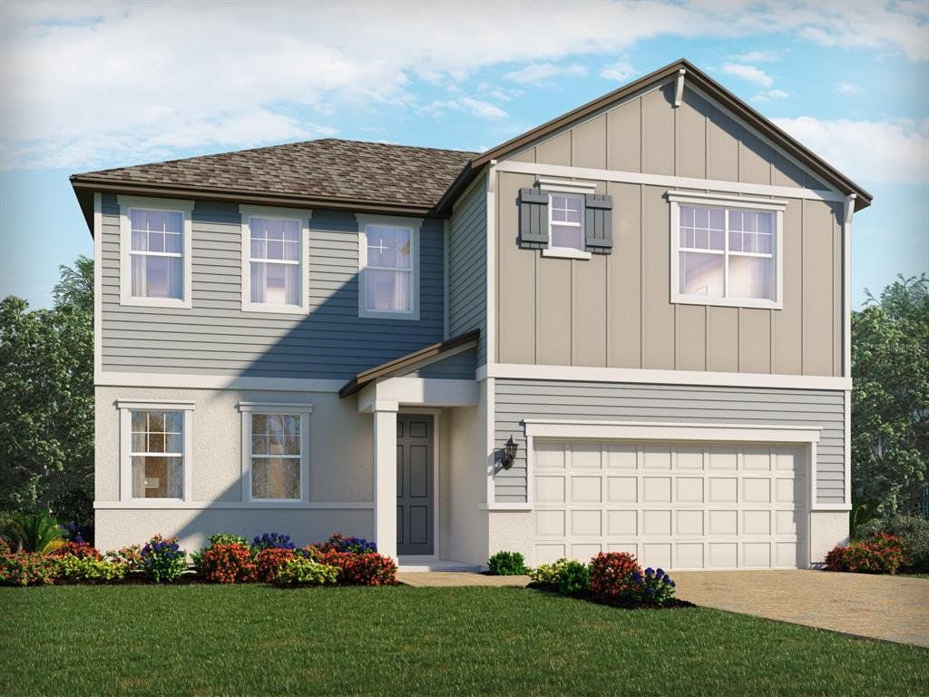 Front exterior of a new home in Legends Preserve - Signature Series, Daytona Beach, FL, highlighting curb appeal (Image 1).
