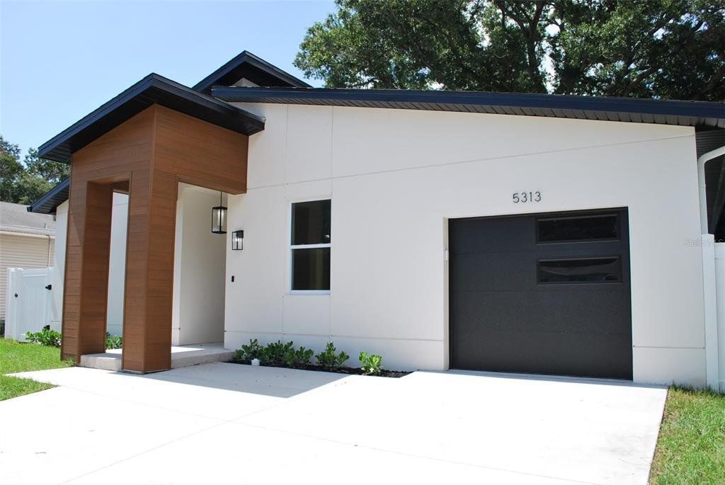 Front exterior of a new home in , Gulfport, FL, highlighting curb appeal (Image 1). Front exterior of a new home in , Gulfport, FL, highlighting curb appeal (Image 1).
