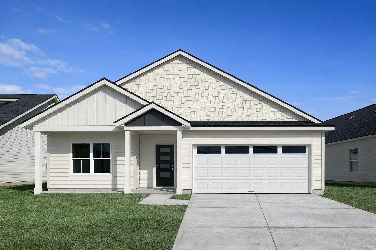 Front exterior of a new home in Hill & Dale Ranch, Splendora, TX, highlighting curb appeal (Image 1). Front exterior of a new home in Hill & Dale Ranch, Splendora, TX, highlighting curb appeal (Image 1).