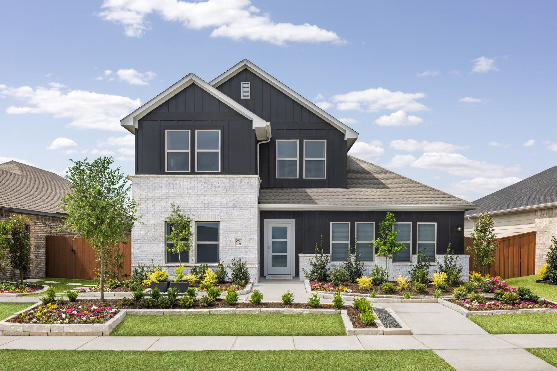 Front exterior of a new home in Heartland, Heartland, TX, highlighting curb appeal (Image 1). Front exterior of a new home in Heartland, Heartland, TX, highlighting curb appeal (Image 1).