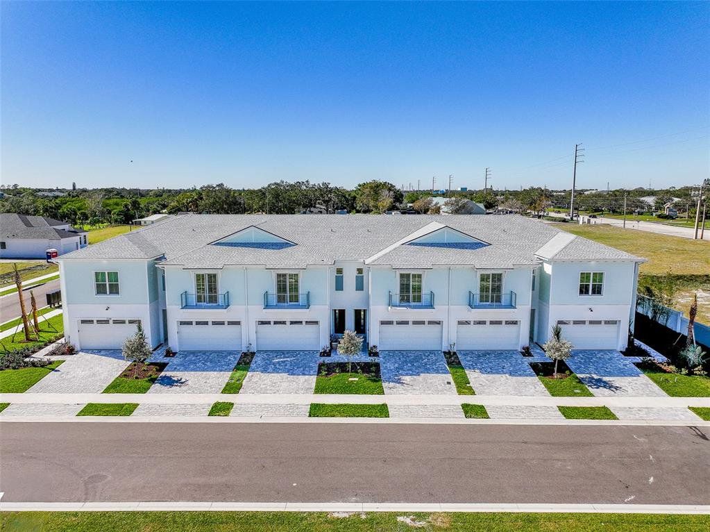 Front exterior of a new home in , Melbourne, FL, highlighting curb appeal (Image 1). Front exterior of a new home in , Melbourne, FL, highlighting curb appeal (Image 1).