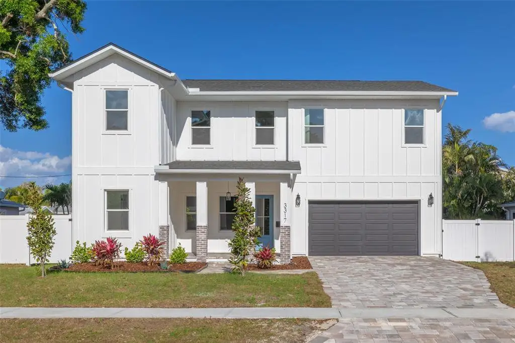 Front exterior of a new home in , St. Petersburg, FL, highlighting curb appeal (Image 1). Front exterior of a new home in , St. Petersburg, FL, highlighting curb appeal (Image 1).