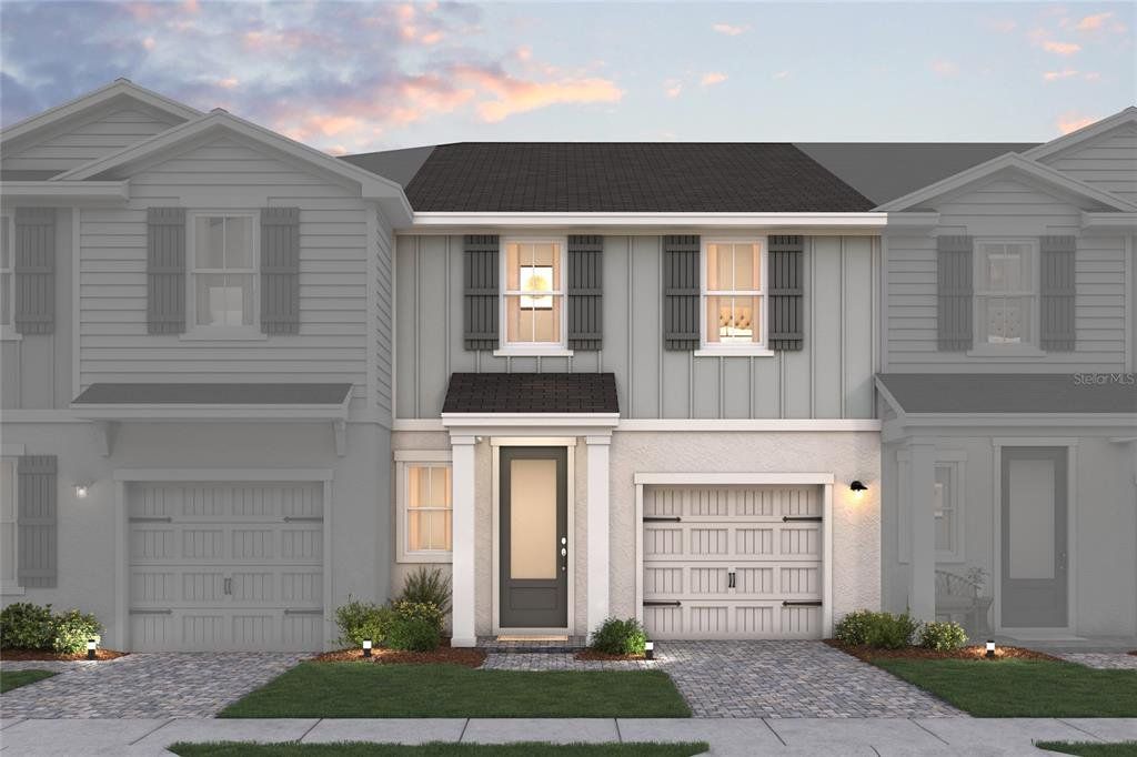 Front exterior of a new home in Aspire at Canter Creek, Davenport, FL, highlighting curb appeal (Image 1). Front exterior of a new home in Aspire at Canter Creek, Davenport, FL, highlighting curb appeal (Image 1).