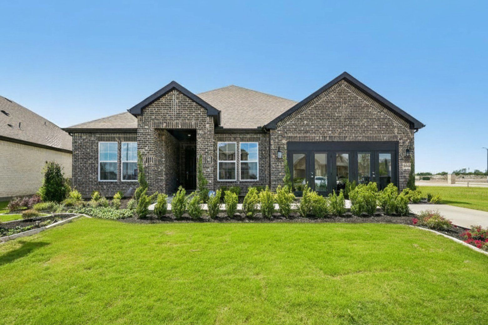 Representative exterior photo of a completed home built from the Aiken by Century Communities in Anna Town Square, Anna, TX (Image 1). Representative exterior photo of a completed home built from the Aiken by Century Communities in Anna Town Square, Anna, TX (Image 1).