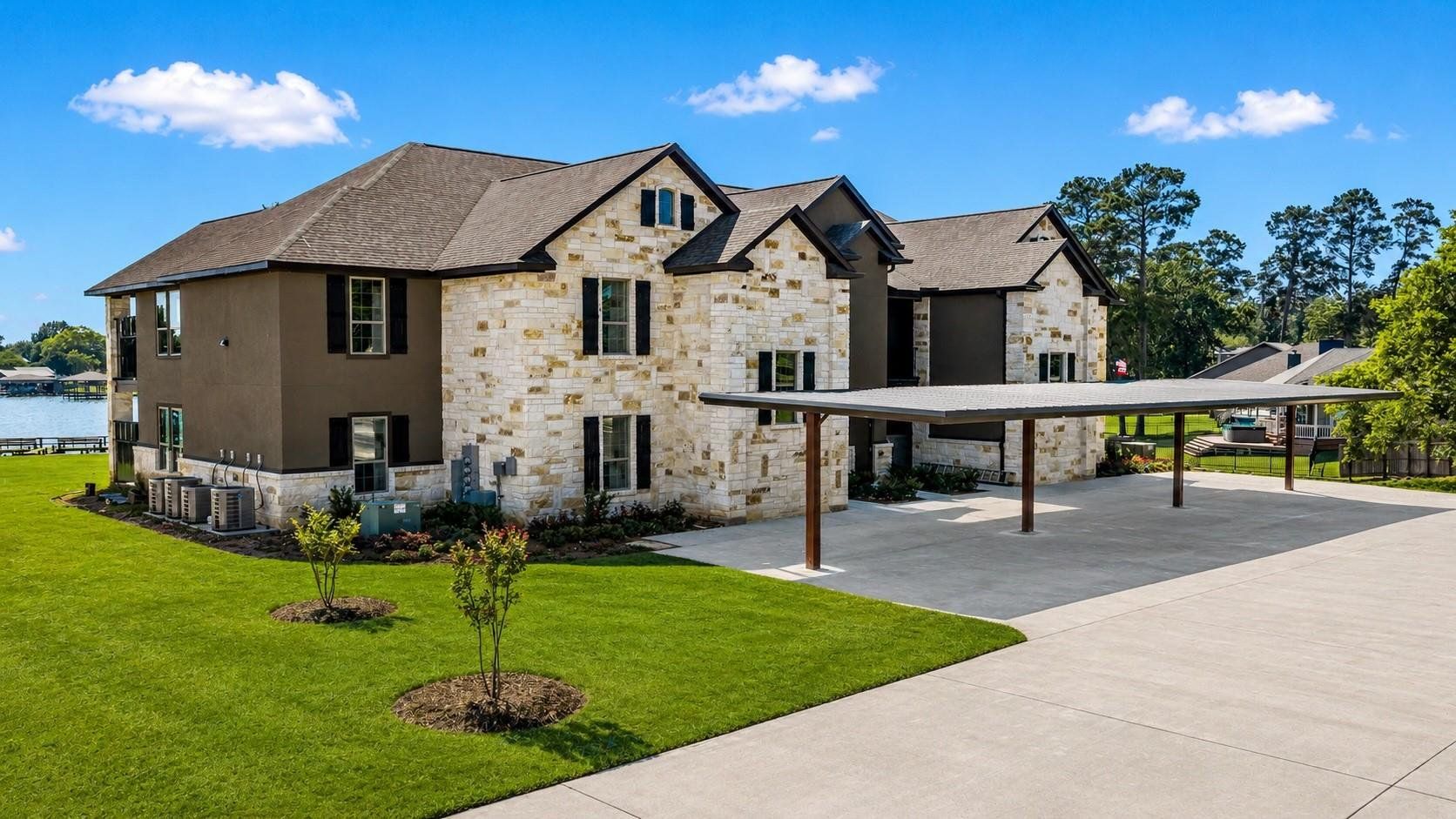 Front exterior of a new home in , Onalaska, TX, highlighting curb appeal (Image 1). Front exterior of a new home in , Onalaska, TX, highlighting curb appeal (Image 1).