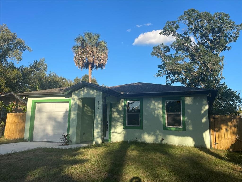Front exterior of a new home in , Tampa, FL, highlighting curb appeal (Image 1). Front exterior of a new home in , Tampa, FL, highlighting curb appeal (Image 1).