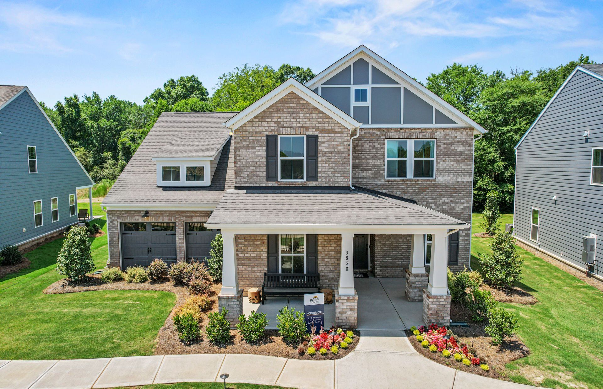 Front exterior of a new home in Riverstone, Monroe, NC, highlighting curb appeal (Image 1). Front exterior of a new home in Riverstone, Monroe, NC, highlighting curb appeal (Image 1).