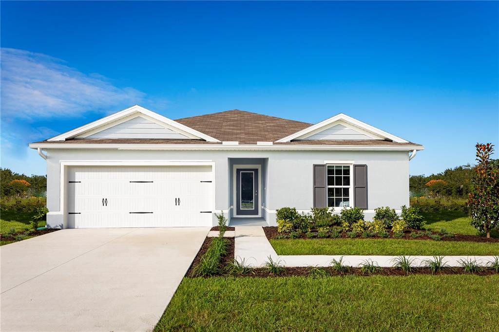 Front exterior of a new home in Laurel Glen, Haines City, FL, highlighting curb appeal (Image 1).