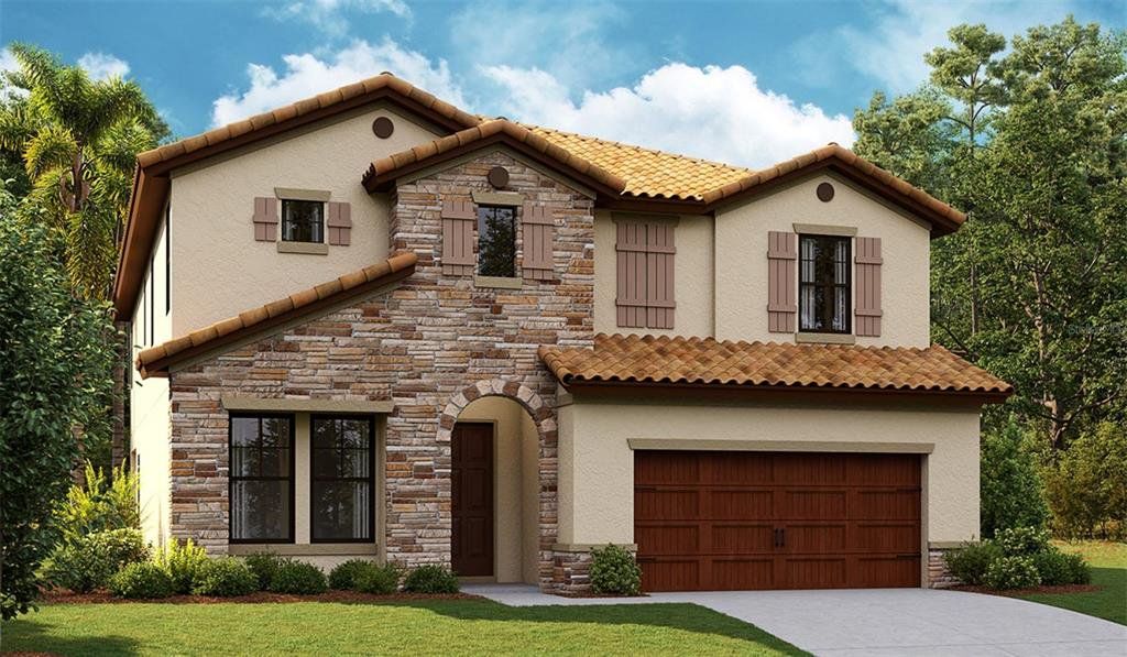 Front exterior of a new home in Crosswind Ranch, Parrish, FL, highlighting curb appeal (Image 1). Front exterior of a new home in Crosswind Ranch, Parrish, FL, highlighting curb appeal (Image 1).