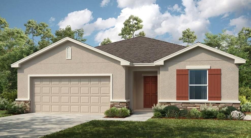 Front exterior of a new home in Waterstone, Groveland, FL, highlighting curb appeal (Image 1). Front exterior of a new home in Waterstone, Groveland, FL, highlighting curb appeal (Image 1).
