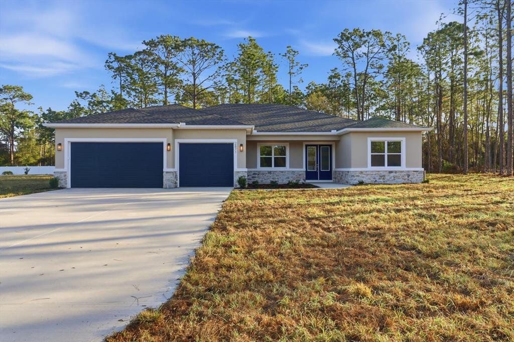Front exterior of a new home in , Beverly Hills, FL, highlighting curb appeal (Image 1). Front exterior of a new home in , Beverly Hills, FL, highlighting curb appeal (Image 1).