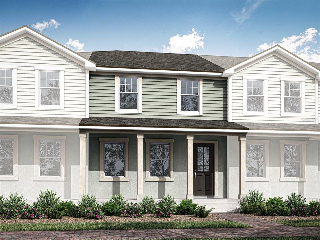 Front exterior of a new home in Rainwood, Clermont, FL, highlighting curb appeal (Image 1). Front exterior of a new home in Rainwood, Clermont, FL, highlighting curb appeal (Image 1).