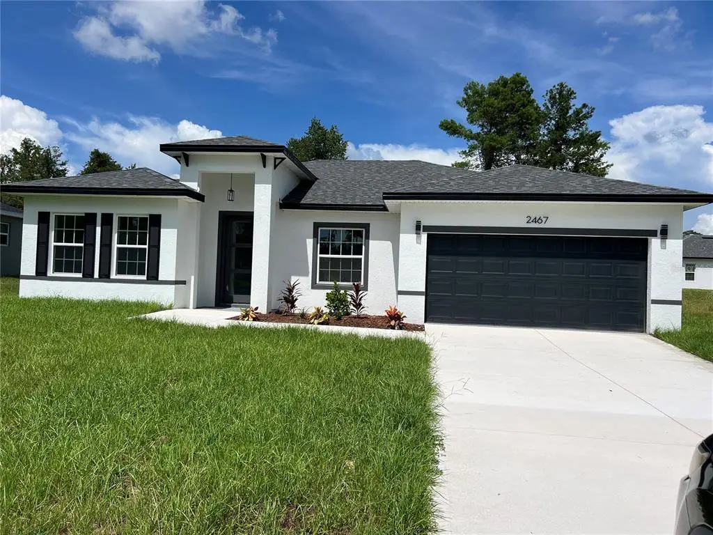 Front exterior of a new home in , Ocala, FL, highlighting curb appeal (Image 1). Front exterior of a new home in , Ocala, FL, highlighting curb appeal (Image 1).