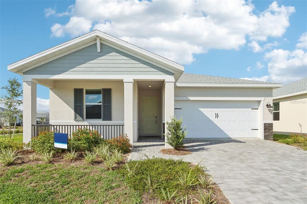 Exterior details and patio area of a home in Crescent Lakes - Reserve Series, Punta Gorda (Image 1). Exterior details and patio area of a home in Crescent Lakes - Reserve Series, Punta Gorda (Image 1).