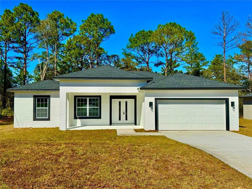 Front exterior of a new home in , Citrus Springs, FL, highlighting curb appeal (Image 1). Front exterior of a new home in , Citrus Springs, FL, highlighting curb appeal (Image 1).
