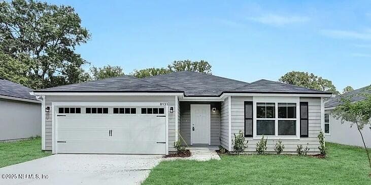 Front exterior of a new home in , Jacksonville, FL, highlighting curb appeal (Image 1). Front exterior of a new home in , Jacksonville, FL, highlighting curb appeal (Image 1).