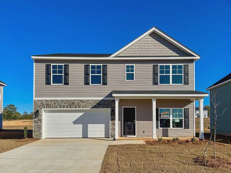Front exterior of a new home in Portrait Hills, Aiken, SC, highlighting curb appeal (Image 1).