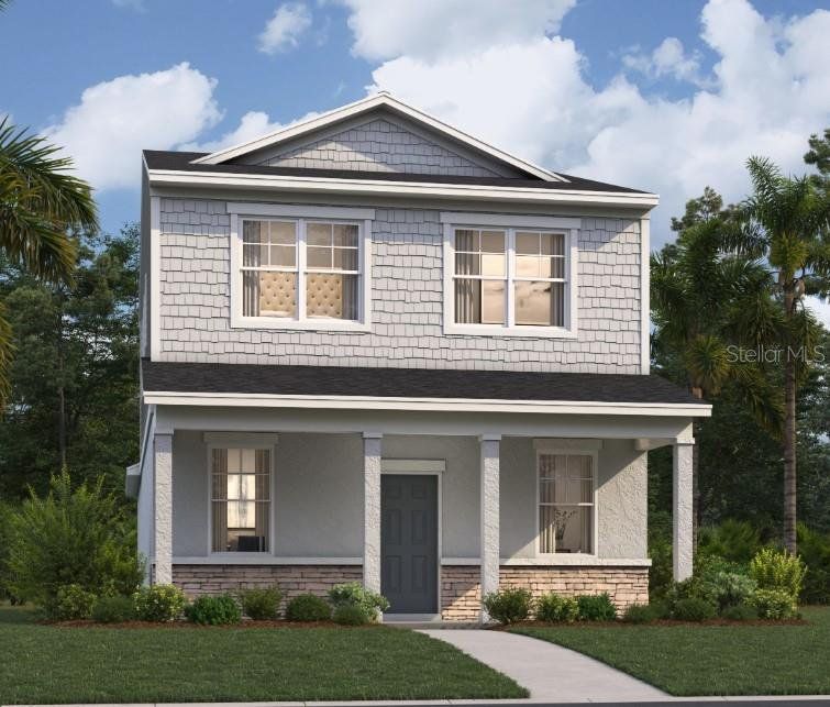 Front exterior of a new home in Brack Ranch, St. Cloud, FL, highlighting curb appeal (Image 1). Front exterior of a new home in Brack Ranch, St. Cloud, FL, highlighting curb appeal (Image 1).