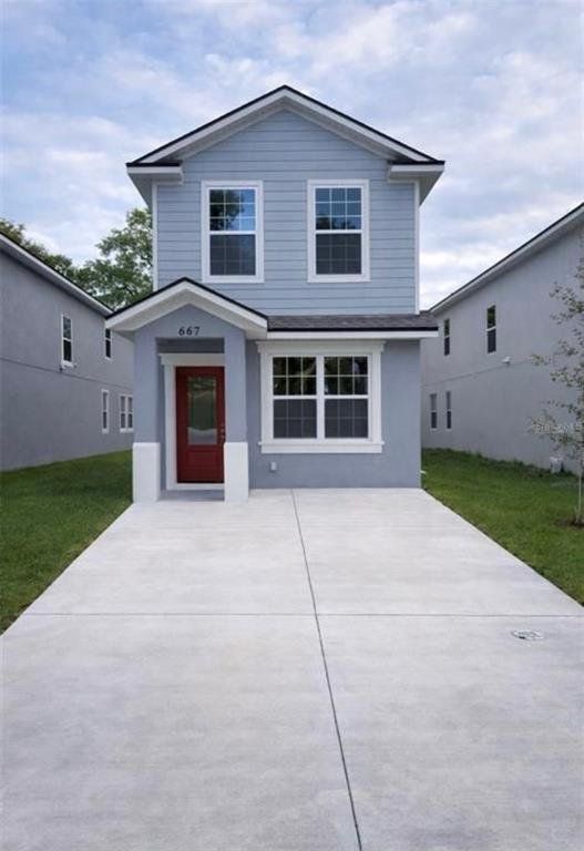 Front exterior of a new home in , Kissimmee, FL, highlighting curb appeal (Image 1). Front exterior of a new home in , Kissimmee, FL, highlighting curb appeal (Image 1).